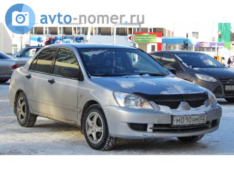 м010нм02, Mitsubishi Lancer